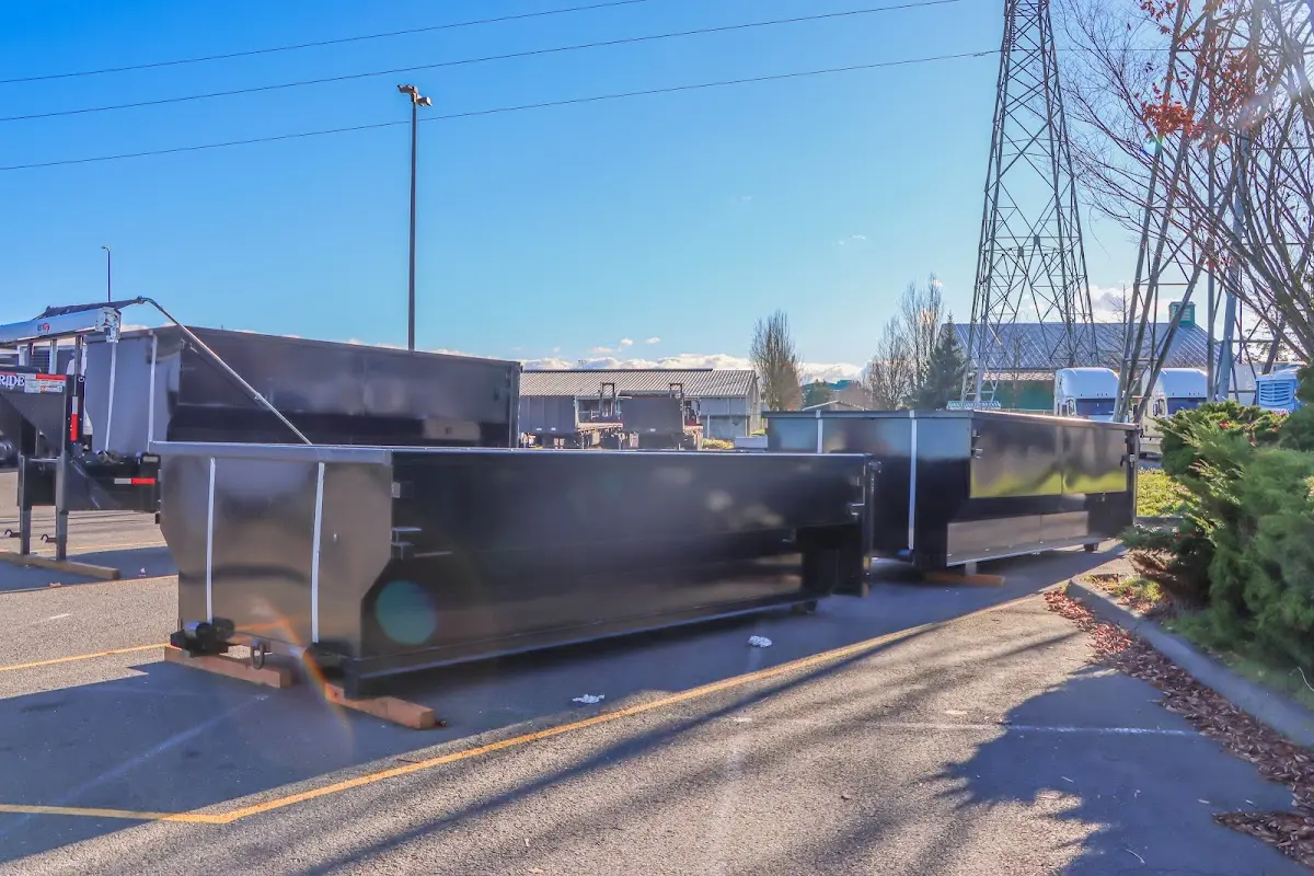 Roll-off dumpster ready for waste disposal at job site for 6 Yard Dumpster Rental in Quincy